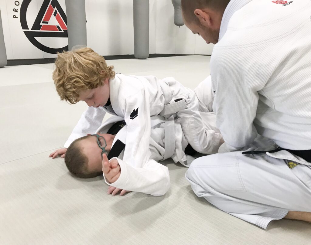 2 kids practicing brazilian_jiu-jitsu in prodigy martial arts