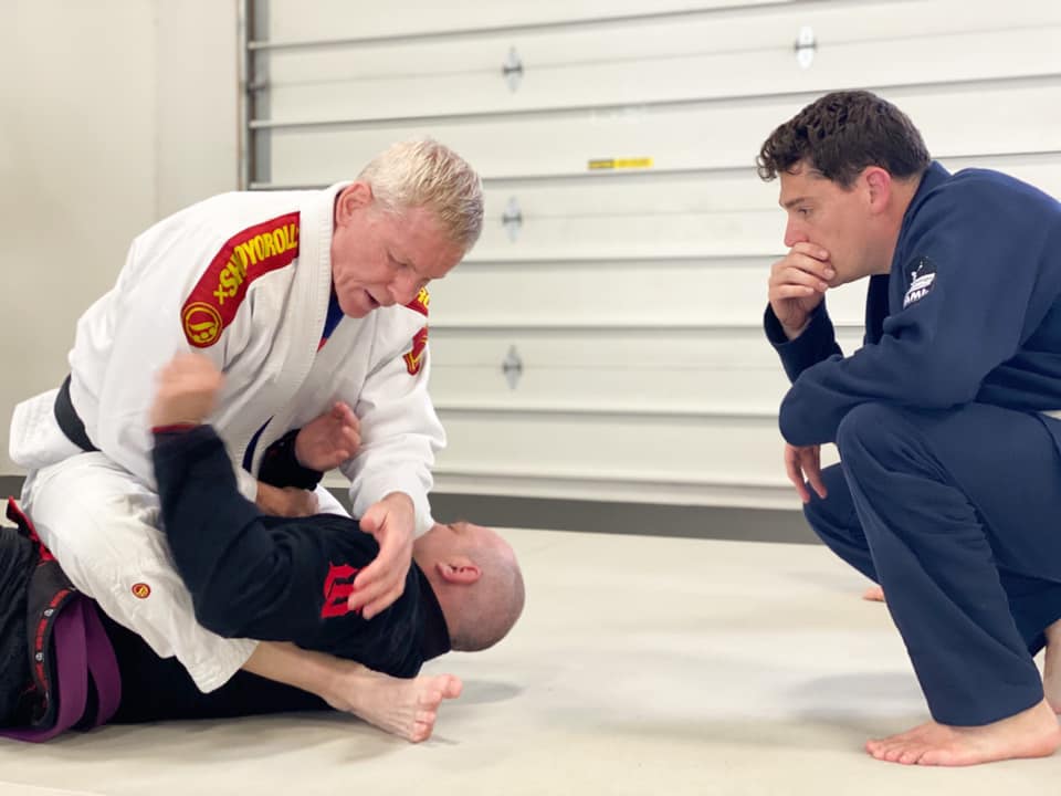 Black Belt in BJJ Showing A Shoulder LockSubmission