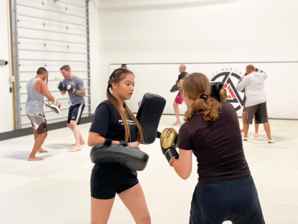 Two Women doing Muay Thai Kickboxing in Blaine MN